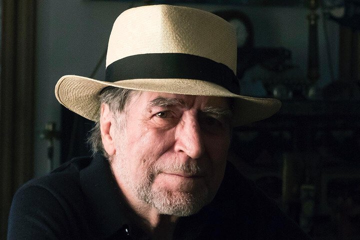Master JoaquΓn Sabina wearing his Montecristi Panama Hat hand woven by Domingo Carranza. this is a customized hat, a special present for the Spanish singer.